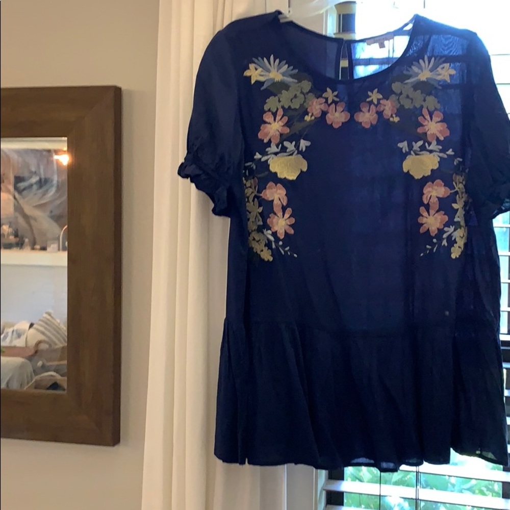 Navy embroidered peplum